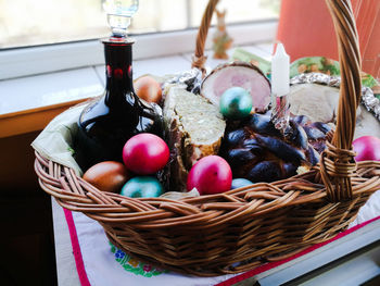 High angle view of eggs in basket on table