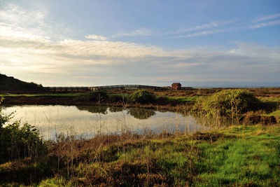 Scenic view of lake against sky