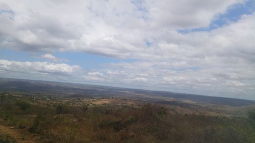 Landscape with mountain range in background