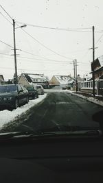 Road seen through car windshield