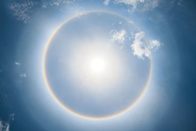 Low angle view of rainbow in sky