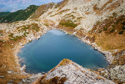 Scenic view of lake amidst mountains