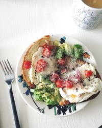 High angle view of fresh healthy breakfast served on table