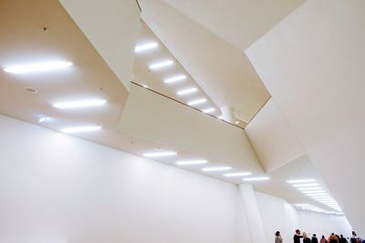 Low angle view of illuminated ceiling