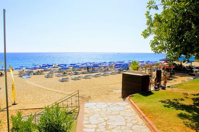 View of beach against clear sky