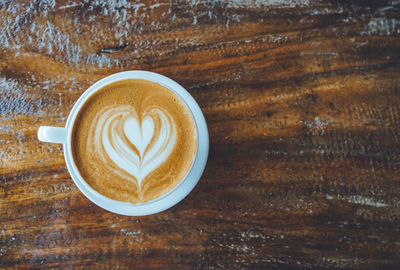 Directly above shot of cappuccino on table