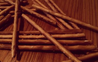 Close-up of wooden sticks on table