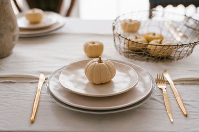 Autumn table setting with pumpkins. decor about thanksgiving