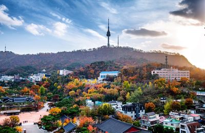 High angle view of townscape against sky during autumn