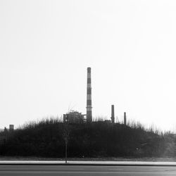 Factory against clear sky