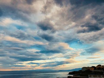 Scenic view of sea against sky at sunset