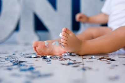 Close-up of hands on table