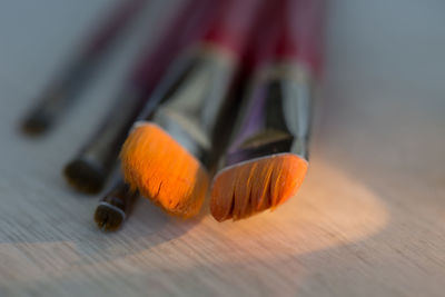 Close-up of paintbrush on table