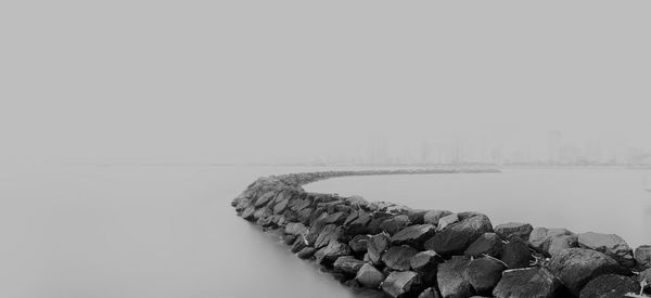 Scenic view of water against sky