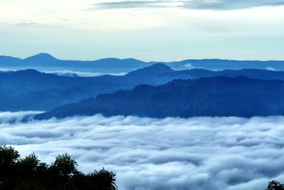 Scenic view of silhouette mountains against sky