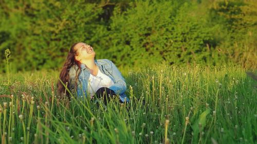 Full length of woman on field