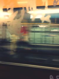 Blurred motion of train at railroad station platform