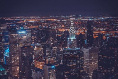 Aerial view of illuminated cityscape at night