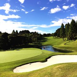 High angle view of golf course against sky