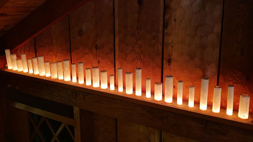 Comfortable warm glow of candles on the mantle 