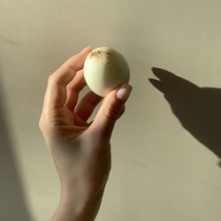 Close-up of hand holding ice cream