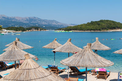 Panoramic view of sea against clear blue sky