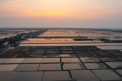 High angle view of cityscape against sky during sunset