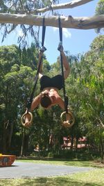 Full length of woman standing in park