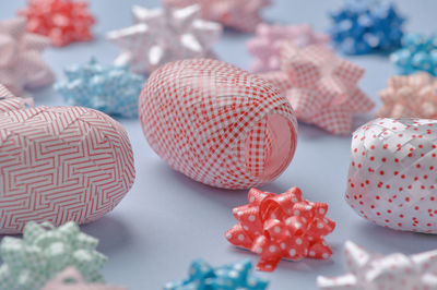 High angle view of pastel color ribbon on table