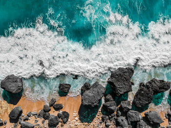 Top view of rocks in sea