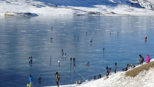 High angle view of people on beach during winter