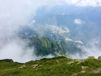 Countryside landscape against clouds