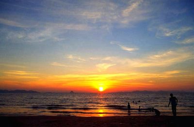 Scenic view of sea at sunset