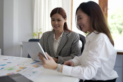 Business colleagues working at office