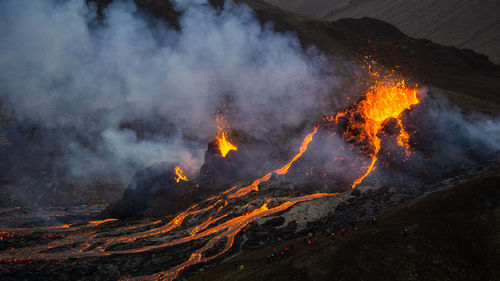 Panoramic view of illuminated mountain