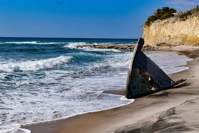 Scenic view of beach against sky