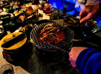 Midsection of person preparing food