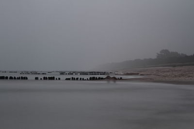 Scenic view of sea against clear sky