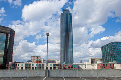 Low angle view of buildings against sky in city