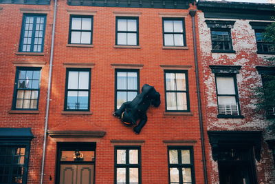 Low angle view of statue on building