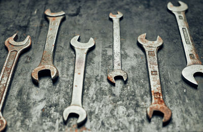 Spanners on steel surface. old rusty wrenches for maintenance. mechanic hardware tools to fix. tech