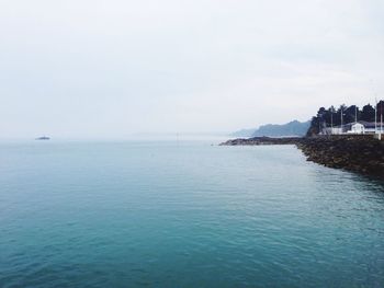 View of calm blue sea against the sky