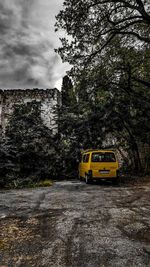 Yellow car on road