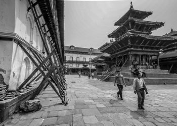 Tourists in front of historic building