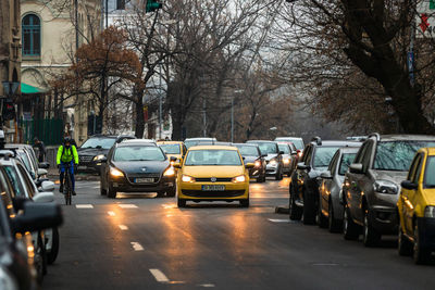 Cars on street in city