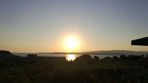 Scenic view of silhouette landscape against sky during sunset