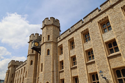 Low angle view of old building against sky