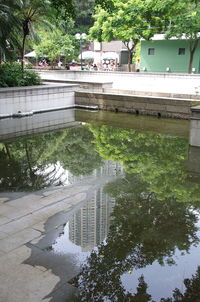 High angle view of bridge over river with buildings in background