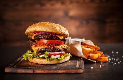 Fresh home-made hamburger served on wood