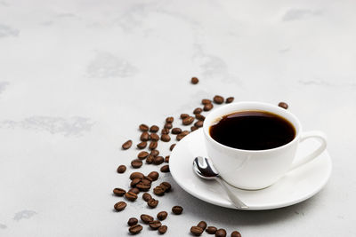 Close-up of coffee cup on table